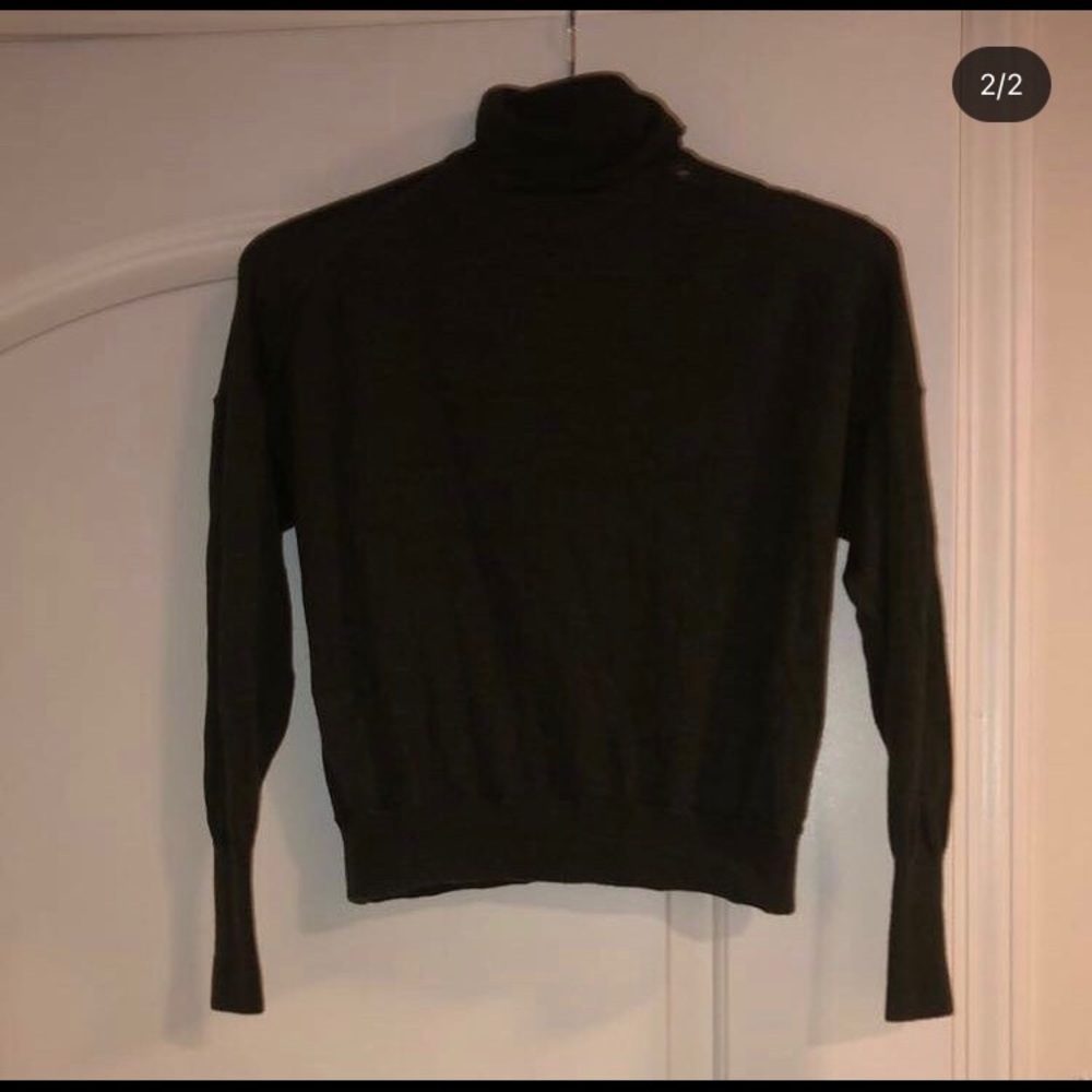 dark green sweater